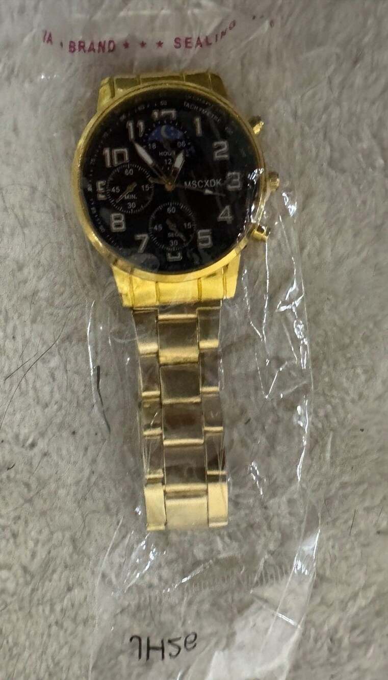 MSCXDK men's gold tone chronograph wristwatch black dial